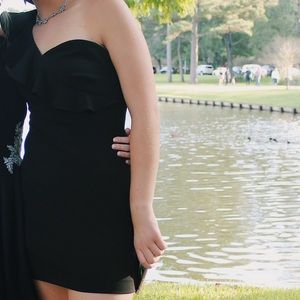 Black Calvin Klein ruffle shoulder dress